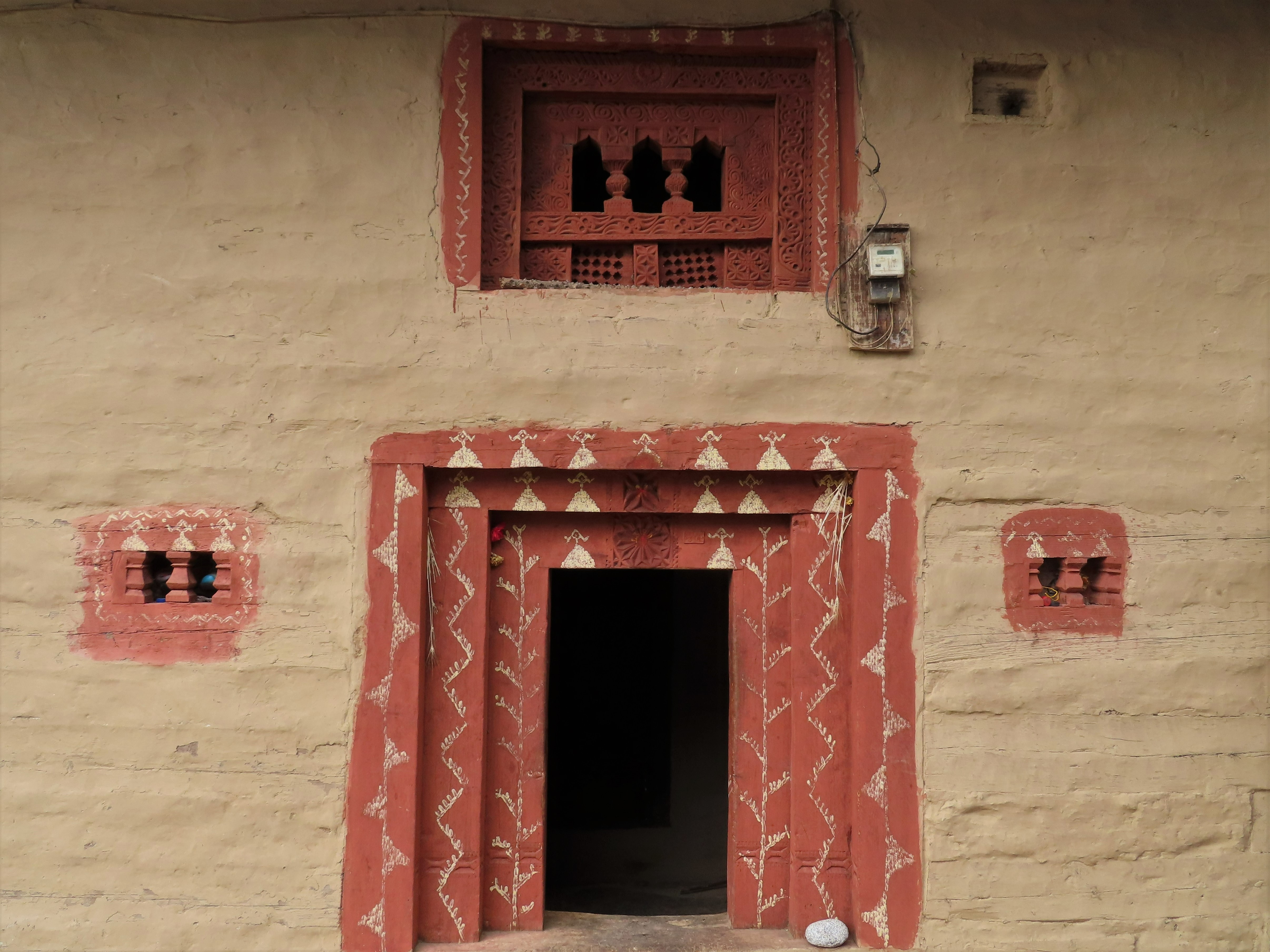Traditional façade of a house in the village of Goshal near Manali, India.