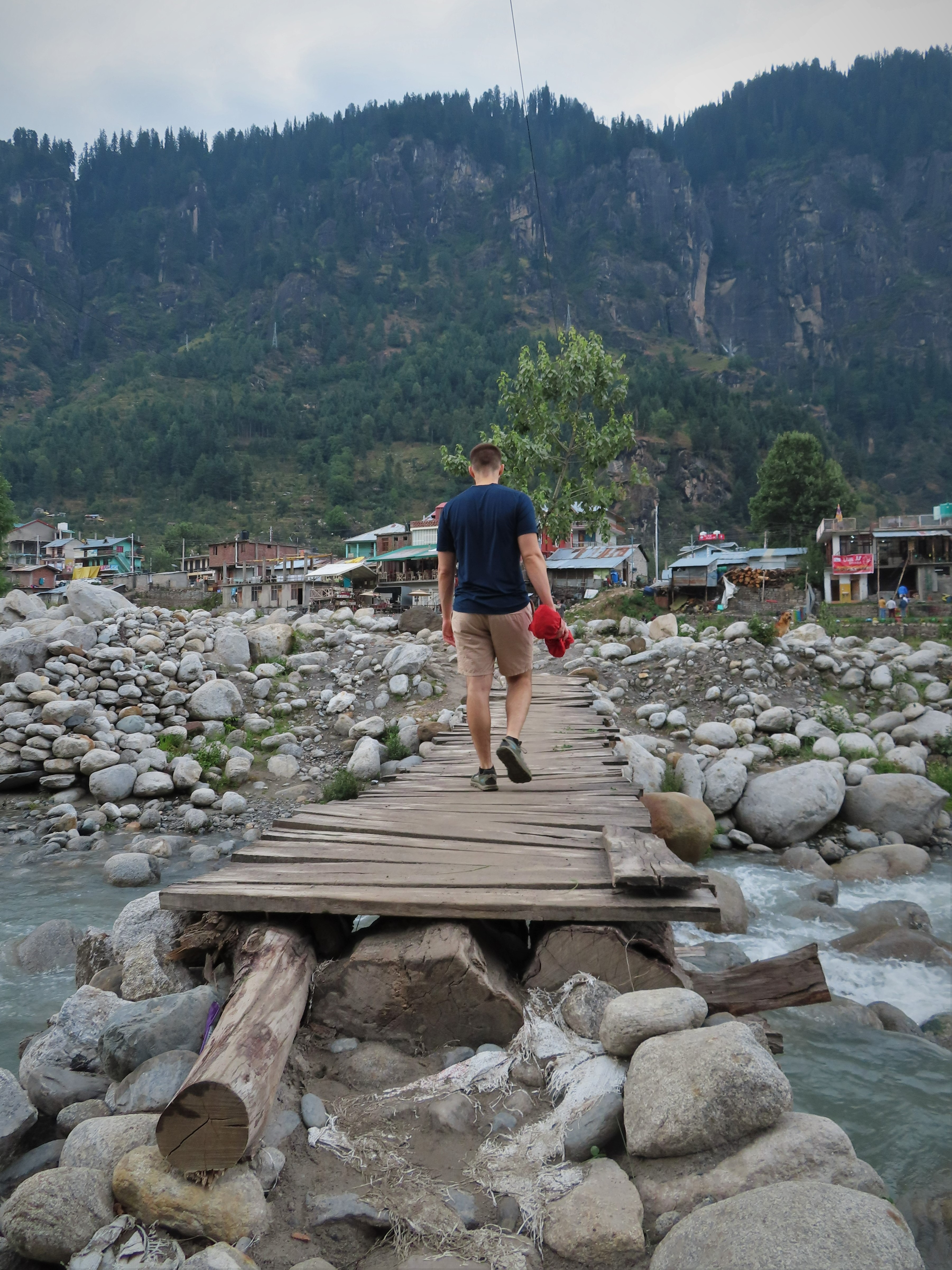 Wooden pedestrian bridge over the Beas river between Goshal and Vashisht, northern India.
