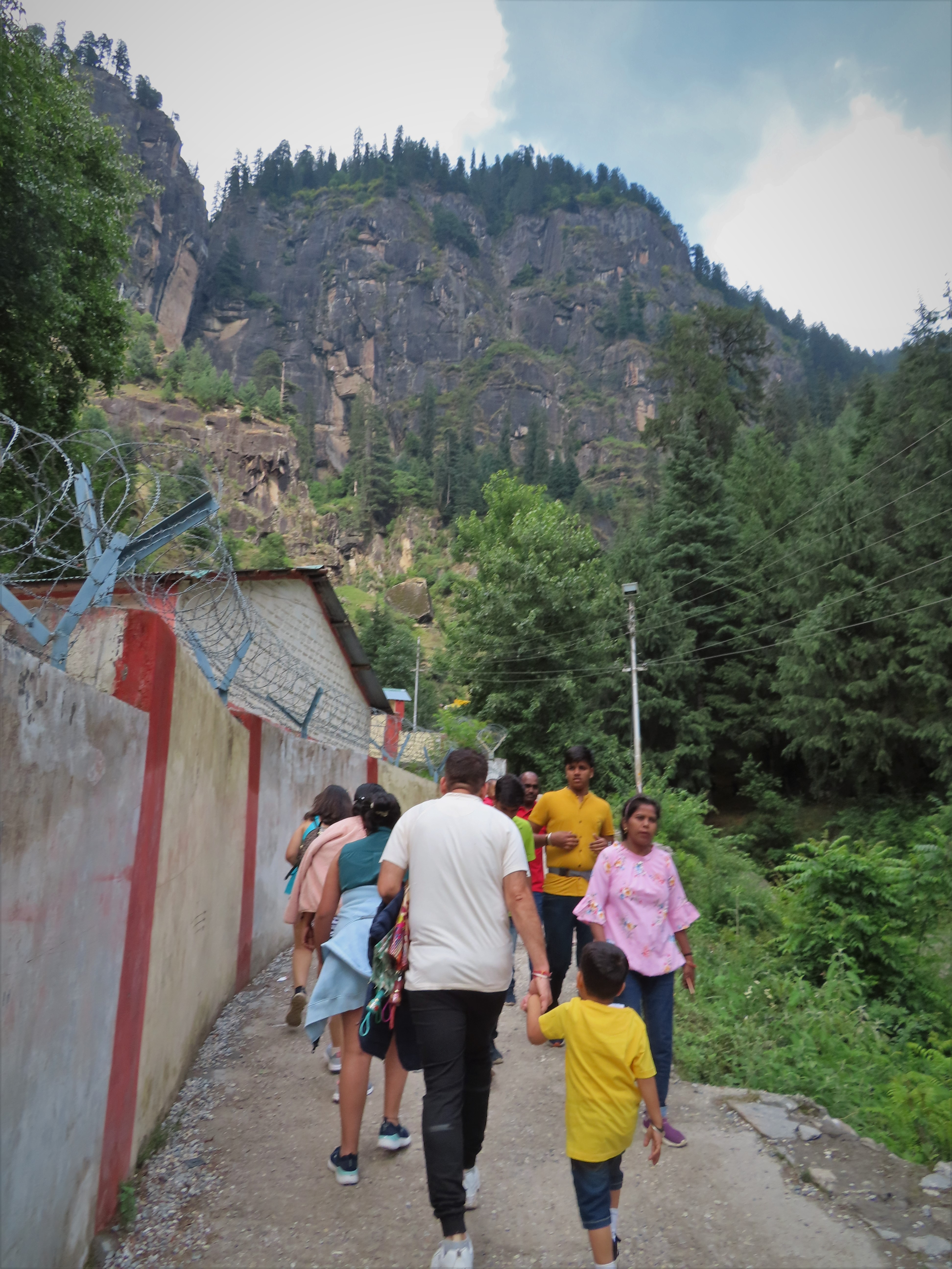 Tourists on their way to Jogini waterfalls in Vashisht, northern India.