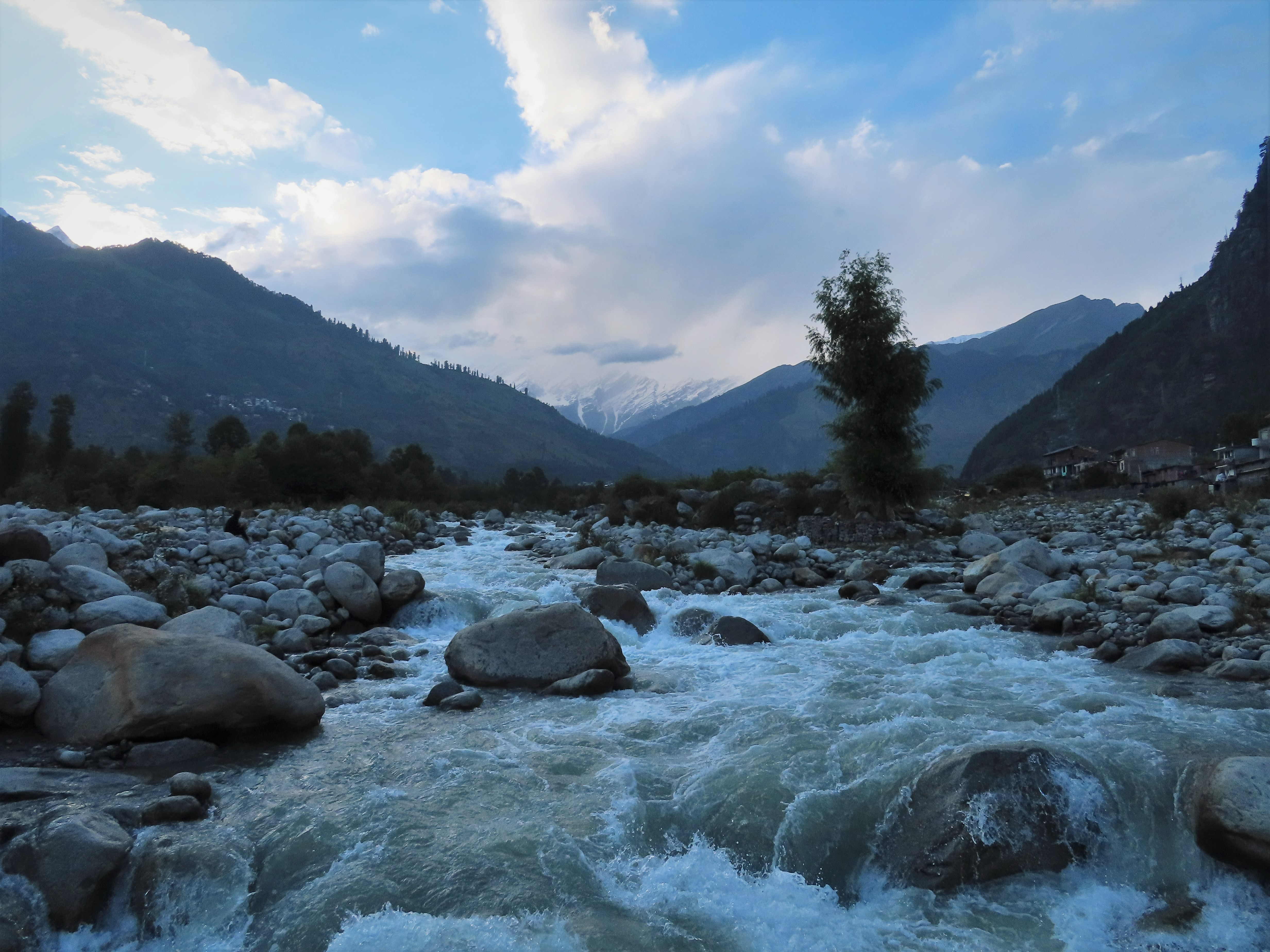 Beas river with Himalayas in the background between Goshal and Vashisht, northern India.